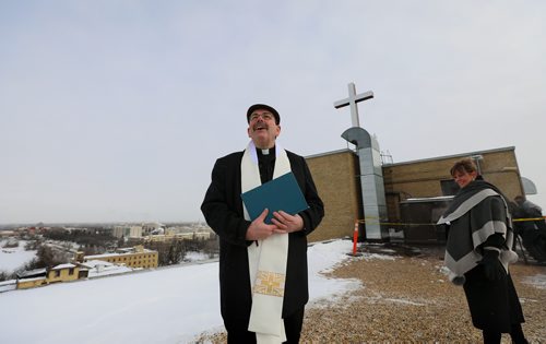 RUTH BONNEVILLE / WINNIPEG FREE PRESS

Standup - ST.B Cross blessing

Archbishop Albert LeGatt blessing the new LED rooftop cross that replaced the one from 1953, with scenes of the downtown surrounding them. 

Also in attendance with the Archbishop is Martine Bouchard, St. Boniface Hospital President and CEO along with engineering staff and St. B in-house media capturing the event Monday. 

Standup 

Feb 11, 2019
