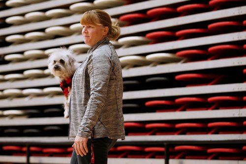 JOHN WOODS / WINNIPEG FREE PRESS
The University of Winnipeg (U of W) Wesmen women's basketball head coach Tanya McKay and her dog Brinny watch their team practice at the University of Winnipeg Tuesday, February 12, 2019. The Wesmen teams have advanced to the second round of the Canada West conference playoffs.