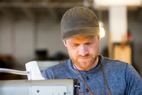 MIKAELA MACKENZIE / WINNIPEG FREE PRESS
Nathan Dueck, owner of Oldhat, works in his retail and workshop space in the exchange district in Winnipeg on Friday, Feb. 8, 2019.
Winnipeg Free Press 2019.