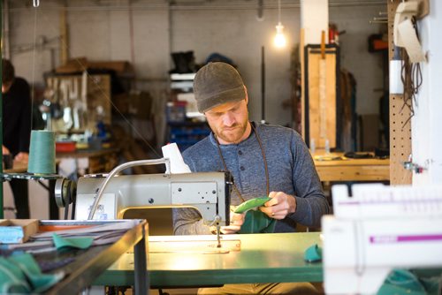 MIKAELA MACKENZIE / WINNIPEG FREE PRESS
Nathan Dueck, owner of Oldhat, works in his retail and workshop space in the exchange district in Winnipeg on Friday, Feb. 8, 2019.
Winnipeg Free Press 2019.