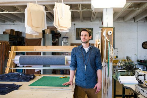 MIKAELA MACKENZIE / WINNIPEG FREE PRESS
Andrew Doerksen, owner of Commonwealth Manufacturing, poses for a portrait in his retail and workshop space in the exchange district in Winnipeg on Friday, Feb. 8, 2019.
Winnipeg Free Press 2019.