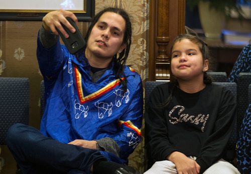 PHIL HOSSACK / WINNIPEG FREE PRESS - Matthew Shorting takes a selfie with his daughter Rae (10) while waiting for the ceremonies to begin at Government House Wednesday evening.

In November 2018, Matthew and Jonathan Meikle came to the aid of a passenger on a City of Winnipeg transit bus who was being threatened by another passenger.  Though successful in keeping their fellow passengers safe by removing the individual from the bus and restraining him until police arrived, Meikle was stabbed during the altercation and required stitches. Lieutenant-Governor Janice C. Filmon will present two Royal Canadian Humane Association Bravery Awards in a ceremony at Government House on Wednesday. Kevin Rollason story. February 13, 2019

