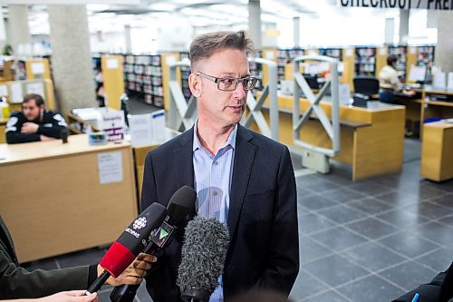 MIKAELA MACKENZIE / WINNIPEG FREE PRESS
Ed Cuddy, manager of library services, talks to the media about the introduction of new security measures, including bag checks and metal detector sweeps, at the Millennium Library in Winnipeg on Friday, Feb. 15, 2019.
Winnipeg Free Press 2019.