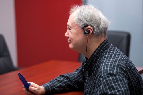 MIKAELA MACKENZIE / WINNIPEG FREE PRESS
Reporter Kevin Rollason tries out the SimVoice technology at the Setcan offices in Winnipeg on Friday, Feb. 15, 2019.
Winnipeg Free Press 2019.