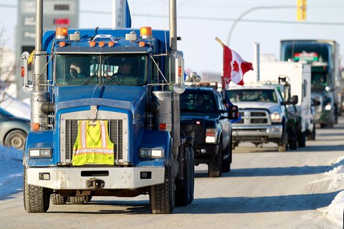 PHIL HOSSACK / WINNIPEG FREE PRESS - A convoy of pipeline supporters heads through the city with a couple of dozen (maybe) trucks pickups and cars headed to Ottawa in protest of the Liberal Government policies. February 15, 2019