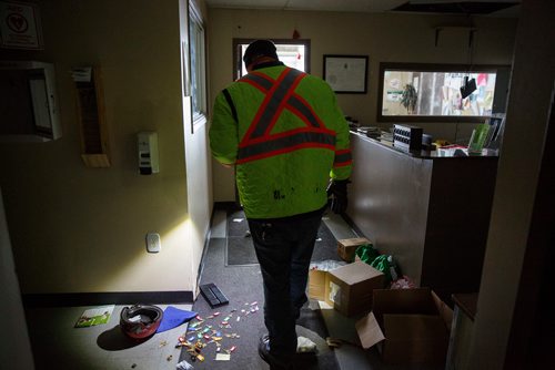 MIKE DEAL / WINNIPEG FREE PRESS
Bear Clan volunteers look for sacred items that they planed on moving to a safe location after they found the Indian and Métis Friendship Centre had been robbed and gutted. The building had been closed and without power some time.
190216 - Saturday, February 16, 2019.