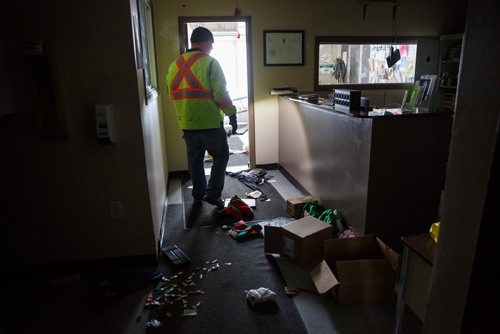 MIKE DEAL / WINNIPEG FREE PRESS
Bear Clan volunteers look for sacred items that they planed on moving to a safe location after they found the Indian and Métis Friendship Centre had been robbed and gutted. The building had been closed and without power some time.
190216 - Saturday, February 16, 2019.