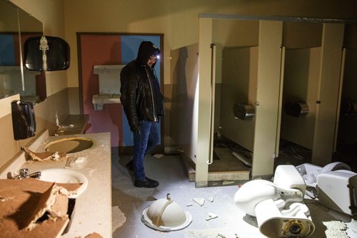 MIKE DEAL / WINNIPEG FREE PRESS
Bear Clan Patrol co-founder James Favel takes media on a tour of the Indian and Métis Friendship Centre the morning after a Bear Clan Patrol noticed that one of the buildings doors was open. When they entered they discovered it had been robbed and gutted. The building had been closed and without power some time.
This is the women's bathroom.
190216 - Saturday, February 16, 2019.