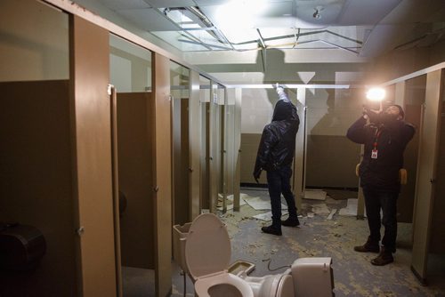 MIKE DEAL / WINNIPEG FREE PRESS
Bear Clan Patrol co-founder James Favel takes media on a tour of the Indian and Métis Friendship Centre the morning after a Bear Clan Patrol noticed that one of the buildings doors was open. When they entered they discovered it had been robbed and gutted. The building had been closed and without power some time.
This is the women's bathroom.
190216 - Saturday, February 16, 2019.