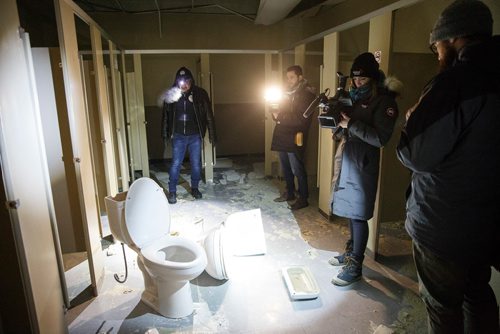 MIKE DEAL / WINNIPEG FREE PRESS
Bear Clan Patrol co-founder James Favel takes media on a tour of the Indian and Métis Friendship Centre the morning after a Bear Clan Patrol noticed that one of the buildings doors was open. When they entered they discovered it had been robbed and gutted. The building had been closed and without power some time.
This is the women's bathroom.
190216 - Saturday, February 16, 2019.