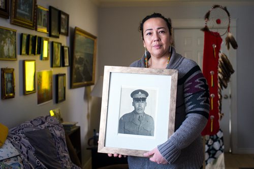 MIKAELA MACKENZIE / WINNIPEG FREE PRESS
Renata Meconse, daughter of Joseph Meconse, poses with a portrait of her father in Winnipeg on Monday, Feb. 18, 2019.
Winnipeg Free Press 2019.