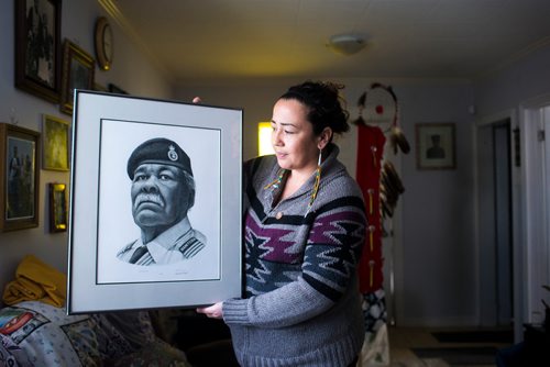 MIKAELA MACKENZIE / WINNIPEG FREE PRESS
Renata Meconse, daughter of Joseph Meconse, poses with a portrait of her father in Winnipeg on Monday, Feb. 18, 2019.
Winnipeg Free Press 2019.