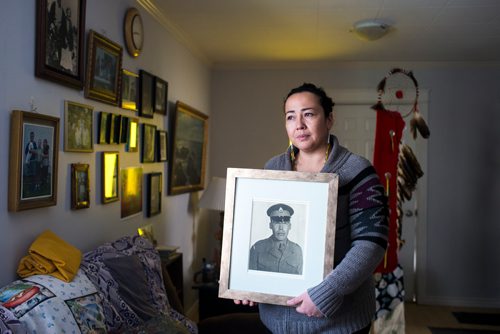 MIKAELA MACKENZIE / WINNIPEG FREE PRESS
Renata Meconse, daughter of Joseph Meconse, poses with a portrait of her father in Winnipeg on Monday, Feb. 18, 2019.
Winnipeg Free Press 2019.