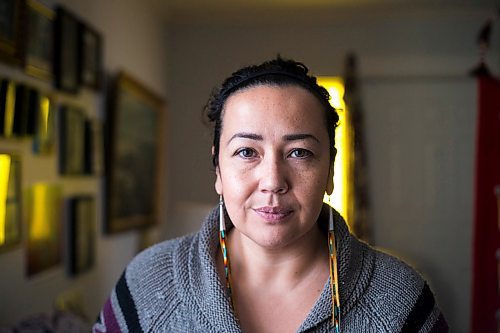 MIKAELA MACKENZIE / WINNIPEG FREE PRESS
Renata Meconse, daughter of Joseph Meconse, poses with a portrait of her father in Winnipeg on Monday, Feb. 18, 2019.
Winnipeg Free Press 2019.