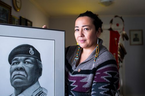 MIKAELA MACKENZIE / WINNIPEG FREE PRESS
Renata Meconse, daughter of Joseph Meconse, poses with a portrait of her father in Winnipeg on Monday, Feb. 18, 2019.
Winnipeg Free Press 2019.