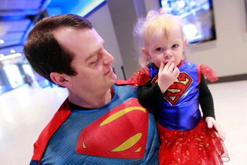 PHIL HOSSACK / WINNIPEG FREE PRESS - STAND-UP -"Look Up....It's a Plane it's a rocket it's....Superkid (and Dad)".  Out looking for peoplke to help, Devon (didn't give his last name) and Jewel (2yrs) were dressed as their favorite superhero's for the Manitoba Moose game and "Super Hero Day" at Bell MTS Centre Monday. The Moose prevailed over the visiting Milwaukee Admirals without any help.  - February 18, 2019