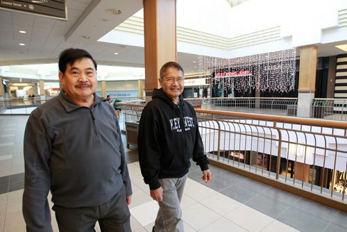 MIKAELA MACKENZIE / WINNIPEG FREE PRESS
Bill Polvorosa (left) and Armand Tesoro walk at Polo Park before the shops open in Winnipeg on Tuesday, Feb. 19, 2019.
Winnipeg Free Press 2019.