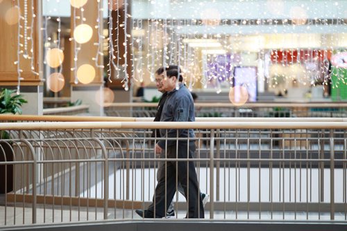 MIKAELA MACKENZIE / WINNIPEG FREE PRESS
Bill Polvorosa (left) and Armand Tesoro walk at Polo Park before the shops open in Winnipeg on Tuesday, Feb. 19, 2019.
Winnipeg Free Press 2019.