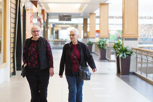 MIKAELA MACKENZIE / WINNIPEG FREE PRESS
Arla Anderson (left) and Shirley Hoban walk at Polo Park before the shops open in Winnipeg on Tuesday, Feb. 19, 2019. 
Winnipeg Free Press 2019.