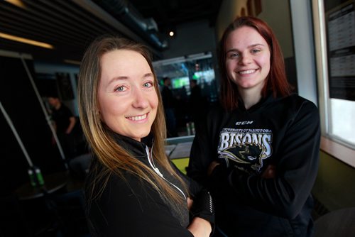 PHIL HOSSACK / WINNIPEG FREE PRESS - BISONS PRESSER - Taylor Allen Story - Volleyball athlete  Cassie Bujan (left) poses with her hockey equivalent Erica Rieder (right) at morning newser for the two teams heading into the post season. February 19, 2019