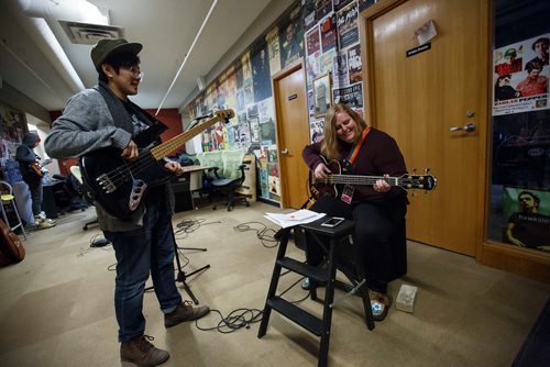 MIKE DEAL / WINNIPEG FREE PRESS
Bass coach Ashley Au (left) with Erin Lebar at the WECC during the Girls Rock Winnipeg Adult Rock Camp.
Reporters Jen Zoratti and Erin Lebar during the Girls Rock Winnipeg Adult Rock Camp at the West End Cultural Centre practicing with their coaches.
190216 - Saturday, February 16, 2019.