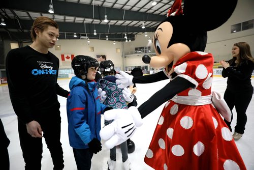 RUTH BONNEVILLE / WINNIPEG FREE PRESS

LOCAL - Disney on Ice

Special Olympics Athlete, Timothy Jolicoeur (8yrs),  gets ready to give Minnie Mouse a hug while skating with Disney On Ice Performers, including a surprise visit from  Mickey and Minnie Mouse, at Bell MTS Iceplex Thursday. 



Special Olympics athletes laced up their skates and had the unique opportunity to show off their skating moves, practice some drills and learn from professional performers with Disney On Ice, including a visit with Disney's Mickey and Minnie Mouse, Thursday prior to the Disney on Ice 100 years of Magic show at Bell MTS this weekend.    
                      
   
   

See Ashley Prest story

Feb 21, 2019
