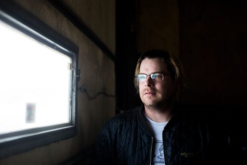 MIKAELA MACKENZIE / WINNIPEG FREE PRESS
Former Winnipeg Transit bus driver Adam Chouinard poses for a portrait at his new workplace, Winnipeg RV, in Winnipeg on Thursday, Feb. 21, 2019. After dozens of accidents, minor assaults, and having a gun pulled on him while behind the wheel, Chouinardonly three years into the jobleft the position.
Winnipeg Free Press 2019.