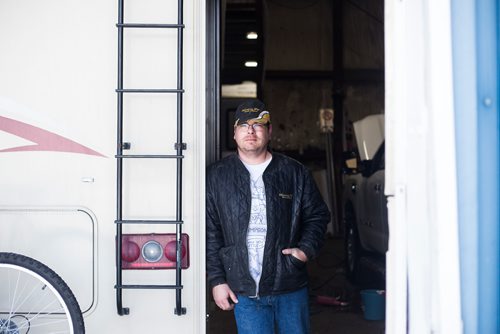 MIKAELA MACKENZIE / WINNIPEG FREE PRESS
Former Winnipeg Transit bus driver Adam Chouinard poses for a portrait at his new workplace, Winnipeg RV, in Winnipeg on Thursday, Feb. 21, 2019. After dozens of accidents, minor assaults, and having a gun pulled on him while behind the wheel, Chouinardonly three years into the jobleft the position.
Winnipeg Free Press 2019.