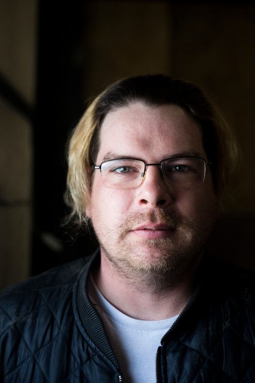 MIKAELA MACKENZIE / WINNIPEG FREE PRESS
Former Winnipeg Transit bus driver Adam Chouinard poses for a portrait at his new workplace, Winnipeg RV, in Winnipeg on Thursday, Feb. 21, 2019. After dozens of accidents, minor assaults, and having a gun pulled on him while behind the wheel, Chouinardonly three years into the jobleft the position.
Winnipeg Free Press 2019.