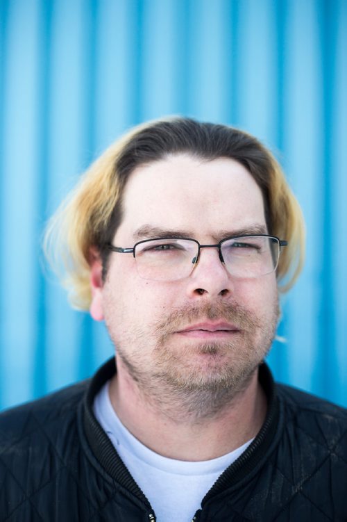 MIKAELA MACKENZIE / WINNIPEG FREE PRESS
Former Winnipeg Transit bus driver Adam Chouinard poses for a portrait at his new workplace, Winnipeg RV, in Winnipeg on Thursday, Feb. 21, 2019. After dozens of accidents, minor assaults, and having a gun pulled on him while behind the wheel, Chouinardonly three years into the jobleft the position.
Winnipeg Free Press 2019.