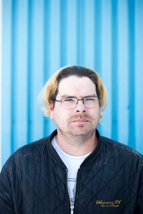 MIKAELA MACKENZIE / WINNIPEG FREE PRESS
Former Winnipeg Transit bus driver Adam Chouinard poses for a portrait at his new workplace, Winnipeg RV, in Winnipeg on Thursday, Feb. 21, 2019. After dozens of accidents, minor assaults, and having a gun pulled on him while behind the wheel, Chouinardonly three years into the jobleft the position.
Winnipeg Free Press 2019.