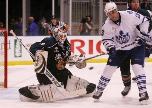 Manitoba Moose goaltender Corey Schneider stops a tip by the Toronto Marlies' Andre Deveaux during the first period of AHL playoff action at the Ricoh Centre in Toronto, ON Thursday, April 23, 2009. Darren Calabrese for The Winnipeg Free Press