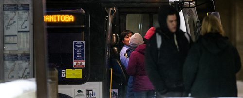 PHIL HOSSACK / WINNIPEG FREE PRESS  - Busses and bus drivers downtown Winnipeg at night. See 49.8 feature.  - Feb 21, 2019.