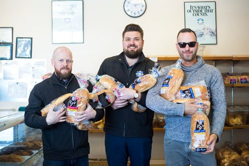 MIKAELA MACKENZIE / WINNIPEG FREE PRESS
City Bread sales managers Kyle Watson (left) and Derek Kostynuik and instagram partner Carew Duffy (@sandwichesandselfies) pose for a portrait at City Bread in Winnipeg on Friday, Feb. 22, 2019.
Winnipeg Free Press 2019.