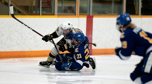 PHIL HOSSACK / WINNIPEG FREE PRESS - Manitoba Bison #29 Allison Sexton and UBC Thunderbird #21 Logan Boyd tumble in playoff action Friday night.  - February 22, 2019.