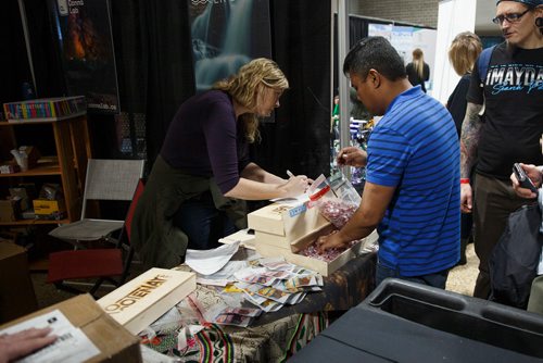 MIKE DEAL / WINNIPEG FREE PRESS
Investigators pack up illegal edible products that contain THC in the Kootenay Labs Booth at the Hempfest Canada Expo at the RBC Convention centre Saturday afternoon.
190223 - Saturday, February 23, 2019.