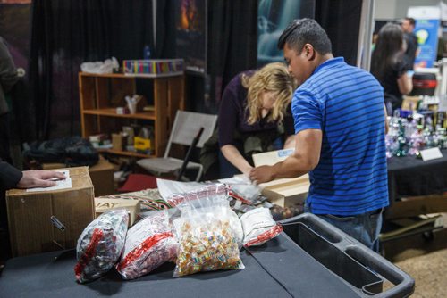 MIKE DEAL / WINNIPEG FREE PRESS
Investigators pack up illegal edible products that contain THC in the Kootenay Labs Booth at the Hempfest Canada Expo at the RBC Convention centre Saturday afternoon.
190223 - Saturday, February 23, 2019.