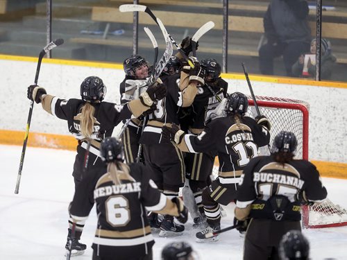 TREVOR HAGAN / WINNIPEG FREE PRESS
Manitoba Bisons' Goaltender Lauren Taraschuk (35) and the rest of the team celebrate after defeating the UBC Thunderbirds to sweep their best of 3 playoff series, Saturday, February 23, 2019.