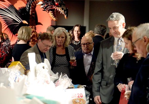 JASON HALSTEAD / WINNIPEG FREE PRESS

Guests check out silent auction prizes at the Alzheimer Society of Manitoba's A Night in Croatia Gala on Feb. 7 2019 at the RBC Convention Centre Winnipeg. (See Social Page)