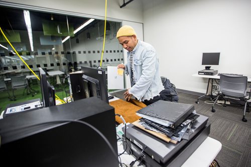 MIKAELA MACKENZIE / WINNIPEG FREE PRESS
Ally Gonzalo cleans up after scanning negatives at the ideaMILL at the Millennium Library in Winnipeg on Monday, Feb. 25, 2019. The library offers much more than books these days, with programs and resources ranging from light therapy lamps to 3D printers.
Winnipeg Free Press 2019.