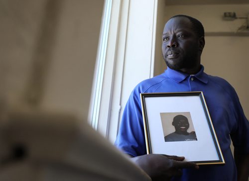 RUTH BONNEVILLE / WINNIPEG FREE PRESS

Aye Madut holds a picture of his cousin Machuar Madut, who was fatally shot by Winnipeg police over the weekend, at press conference held by concerned members of Winnipegs South Sudanese community on Monday.  

See story by Ryan Thorpe.  

Feb 25, 2019

