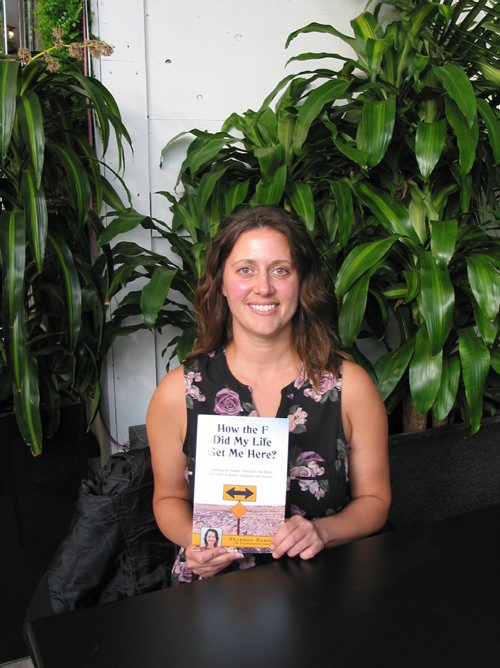 Canstar Community News Feb. 19, 2019 - Shannon Russell, of Oak Bluff, holds a copy of the book she wrote to share her experience of self-discovery and acceptance with others. (ANDREA GEARY/CANSTAR COMMUNITY NEWS)