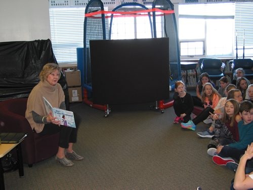 Canstar Community News Feb. 19, 2019 - Manitoba's Lieutenant-Governor Janice Filmon is shown reading a book about Viola Desmond to Grade 4 to 6 students at Oak Bluff Community School on Feb. 19 to celebrate I Love to Read Month. (ANDREA GEARY/CANSTAR COMMUNITY NEWS)