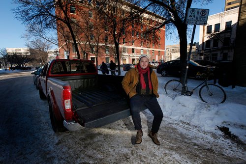 PHIL HOSSACK / WINNIPEG FREE PRESS - Philip Mikulec, operations manager of Peg City Co-op poses with one of their vehicles parked in the change district Wednesday. See story. - February 27, 2019.