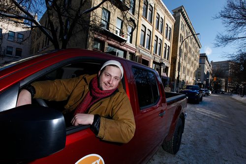 PHIL HOSSACK / WINNIPEG FREE PRESS - Philip Mikulec, operations manager of Peg City Co-op poses with one of their vehicles parked in the change district Wednesday. See story. - February 27, 2019.