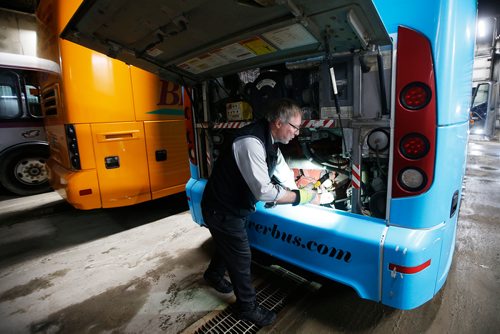 JOHN WOODS / WINNIPEG FREE PRESS
Roger Hamelin, a bus driver with Beaver Bus Lines, inspects his bus that he will driving to Waywayseecappo and back Sunday, February 24, 2019. Hamelin drove from Winnipeg to Steinbach to pick up the Steinbach Pistons and then onto Waywayseecappo where they played the Waywayseecappo Wolverines and then back to Winnipeg in what turned out to be an eighteen hour day.