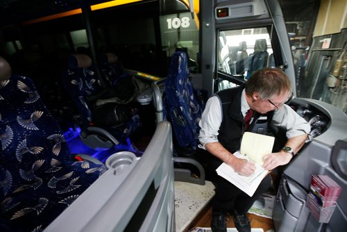 JOHN WOODS / WINNIPEG FREE PRESS
Roger Hamelin, a bus driver with Beaver Bus Lines, prepares his logs on his bus that he will driving to Waywayseecappo and back Sunday, February 24, 2019. Hamelin drove from Winnipeg to Steinbach to pick up the Steinbach Pistons and then onto Waywayseecappo where they played the Waywayseecappo Wolverines and then back to Winnipeg in what turned out to be an eighteen hour day.
