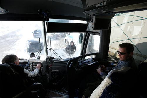 JOHN WOODS / WINNIPEG FREE PRESS
Roger Hamelin, a bus driver with Beaver Bus Lines, and Paul Dyck, coach of the Steinbach Pistons wait for 3.5 hours in Headingley for the road to open so he can drive his bus  to Waywayseecappo and back Sunday, February 24, 2019. Hamelin drove from Winnipeg to Steinbach to pick up the Steinbach Pistons and then onto Waywayseecappo where they played the Waywayseecappo Wolverines and then back to Winnipeg in what turned out to be an eighteen hour day.