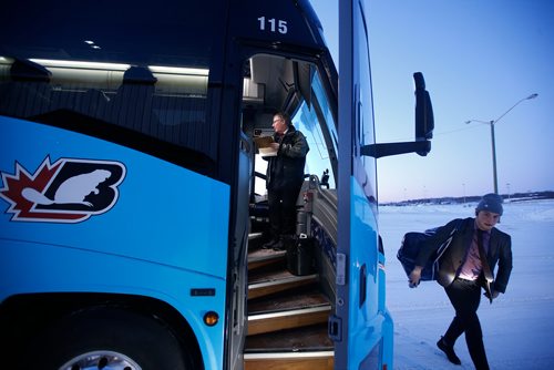 JOHN WOODS / WINNIPEG FREE PRESS
Roger Hamelin, a bus driver with Beaver Bus Lines, updates his log book on his bus as players head into the arena at Waywayseecappo Sunday, February 24, 2019. Hamelin drove from Winnipeg to Steinbach to pick up the Steinbach Pistons and then onto Waywayseecappo where they played the Waywayseecappo Wolverines and then back to Winnipeg in what turned out to be an eighteen hour day.