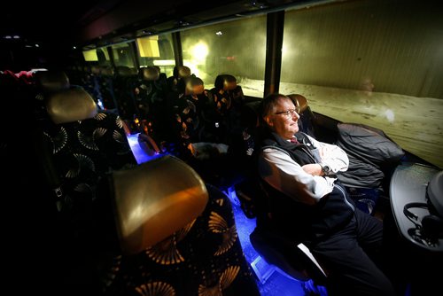 JOHN WOODS / WINNIPEG FREE PRESS
Roger Hamelin, a bus driver with Beaver Bus Lines, takes a break on his bus as the Steinbach Pistons play their game in Waywayseecappo Sunday, February 24, 2019. Hamelin drove from Winnipeg to Steinbach to pick up the Steinbach Pistons and then onto Waywayseecappo where they played the Waywayseecappo Wolverines and then back to Winnipeg in what turned out to be an eighteen hour day.